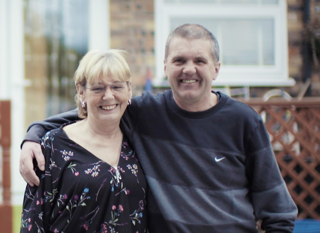 man and women smiling