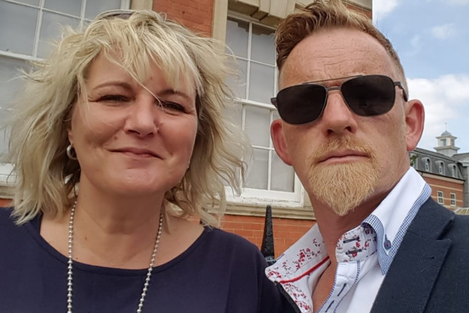 Georgina and Andrew smile at the camera - Shared Lives PSS UK